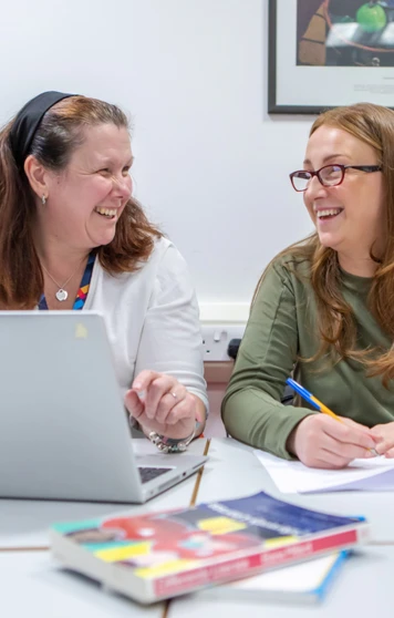 A joyful interaction captured between a Glasgow Kelvin College lecturer and student, emphasising the positive, welcoming learning environment. A joyful interaction captured between a Glasgow Kelvin College lecturer and student, emphasising the positive, welcoming learning environment.